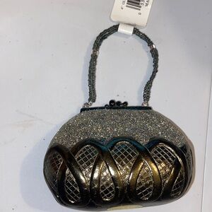 I beautiful purse ornament with glitter and bead handle on the purse T30